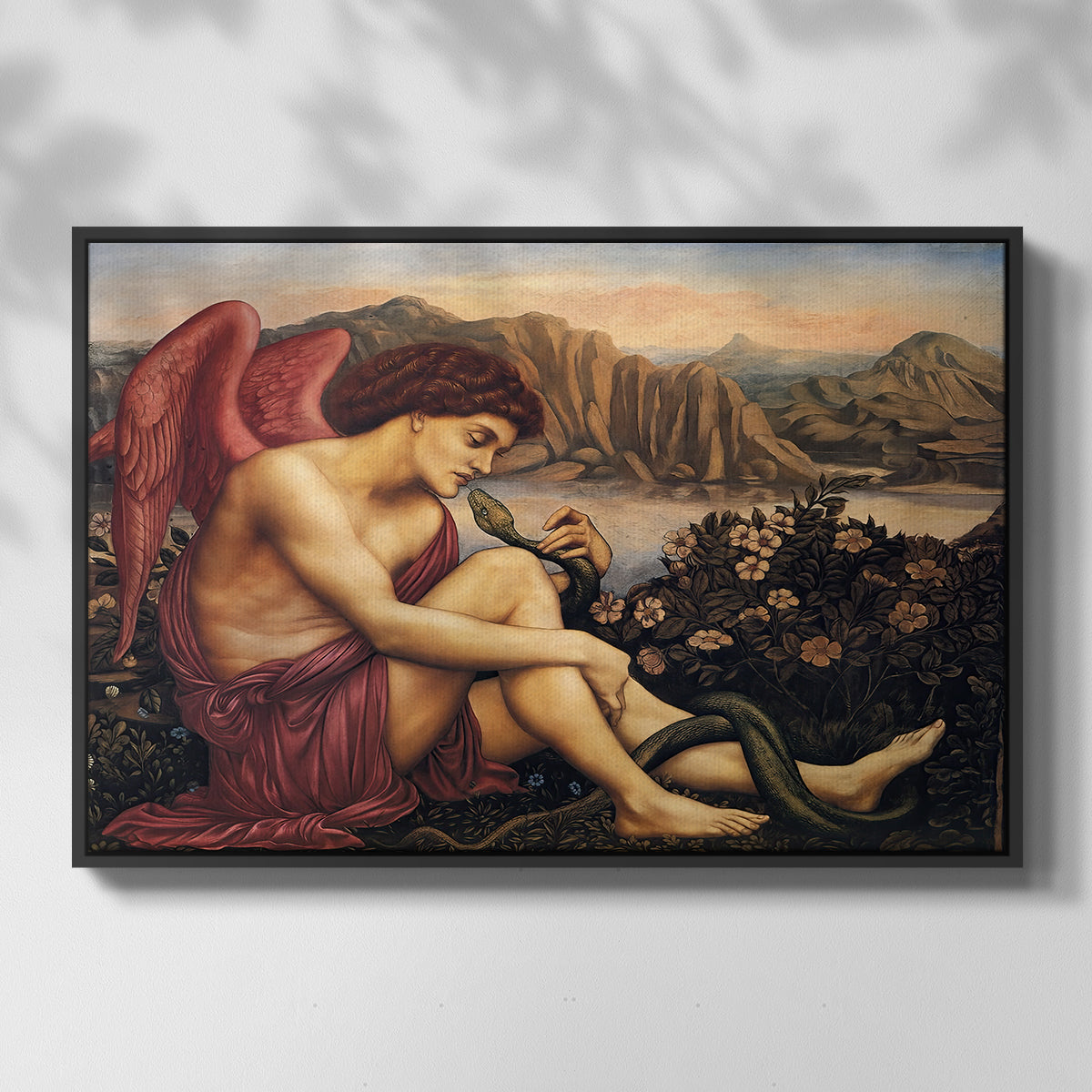 Front view of The Angel with the Serpent, c. 1870-1875 by Evelyn De Morgan in a black floater framed canvas.