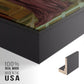 Close-up of the black floater frame corner and gallery wrapped canvas construction.