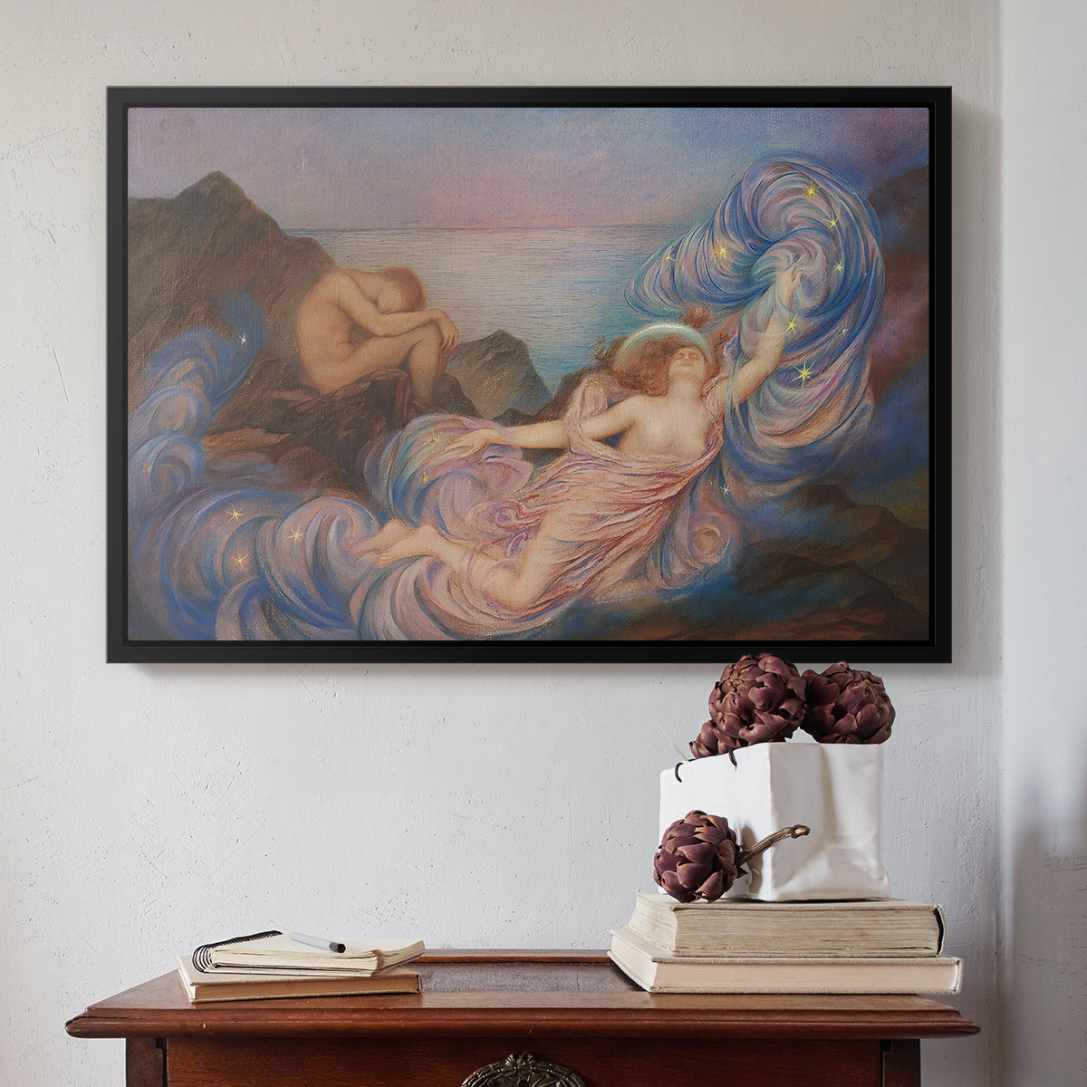 Black floater framed canvas featuring Twilight, 1914 by Evelyn De Morgan above an entryway table in a minimalist foyer.