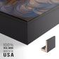 Close-up of the black floater frame corner and gallery wrapped canvas construction.