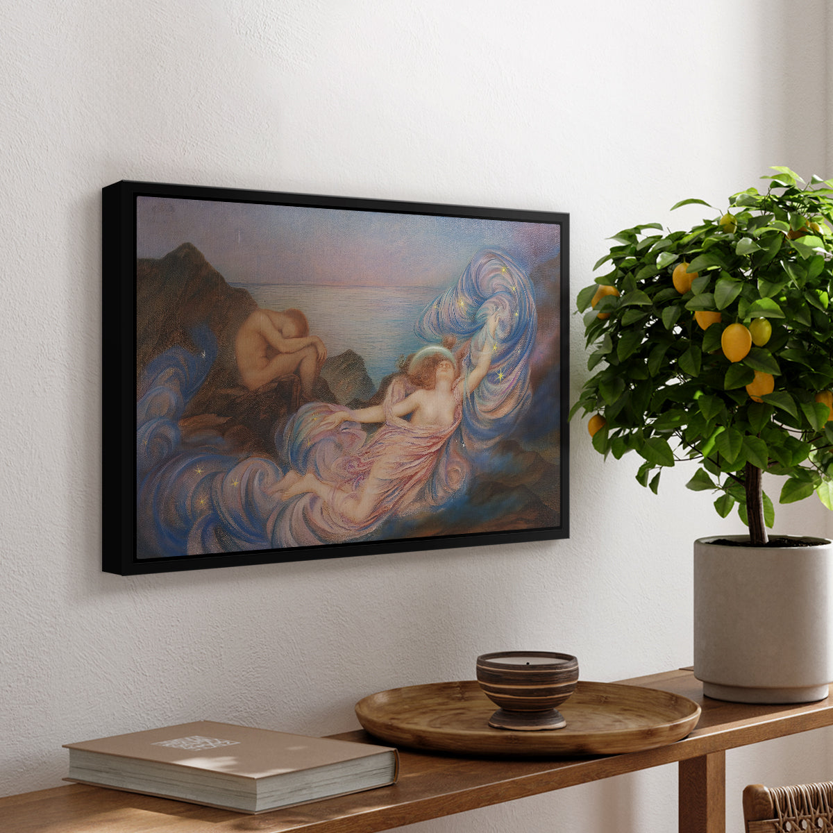 Twilight, 1914 by Evelyn De Morgan, presented in a black floater framed canvas featuring a reclining female figure beneath glowing sky at twilight with soft colors, displayed above a hallway console table.