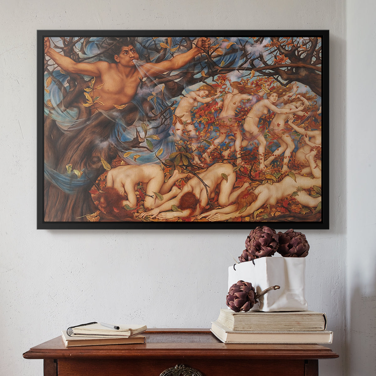 Black floater framed canvas featuring Boreas and the Fallen Leaves, c. 1910-1914 by Evelyn De Morgan above an entryway table in a minimalist foyer.