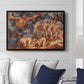 Boreas and the Fallen Leaves, c. 1910-1914 by Evelyn De Morgan displayed above a sofa in a living room in a black floater frame, featuring a mythological scene of wind god Boreas moving through autumn leaves.