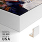 Close-up of the white floater frame corner and gallery wrapped canvas construction.