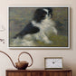 White floater framed canvas featuring a close-up of a small dog in motion surrounded by rippling water, displayed above a cabinet in a soft-toned living room.