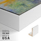 Close-up of the white floater frame corner and gallery wrapped canvas construction.