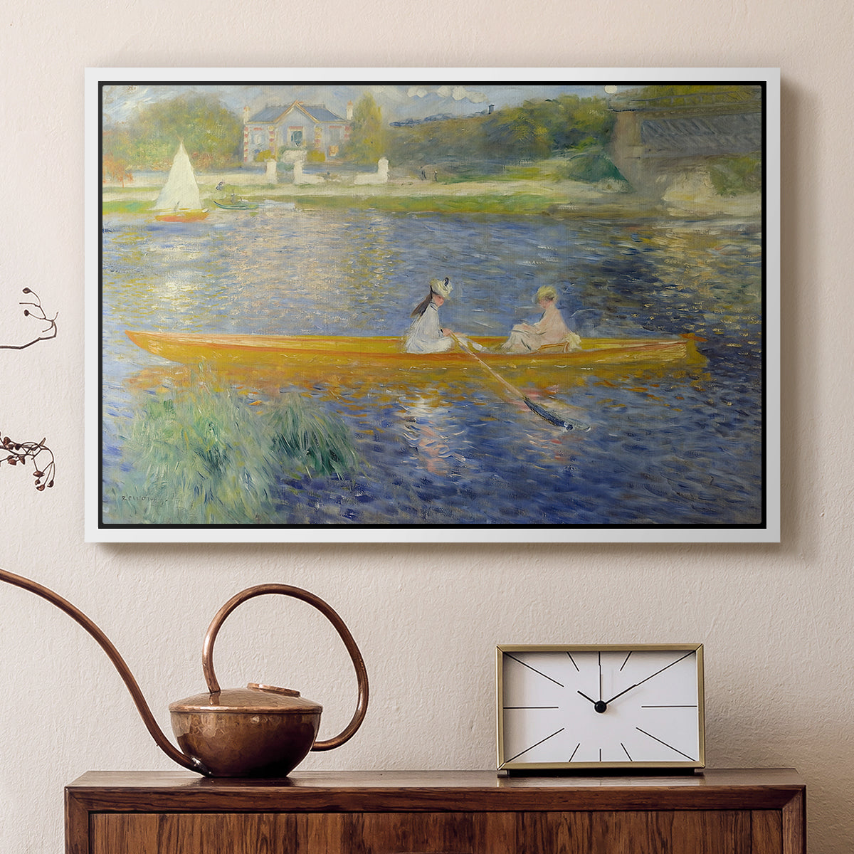 White floater framed canvas featuring a couple seated in boat on river surrounded by soft reflections, displayed above a cabinet in a soft-toned living room.