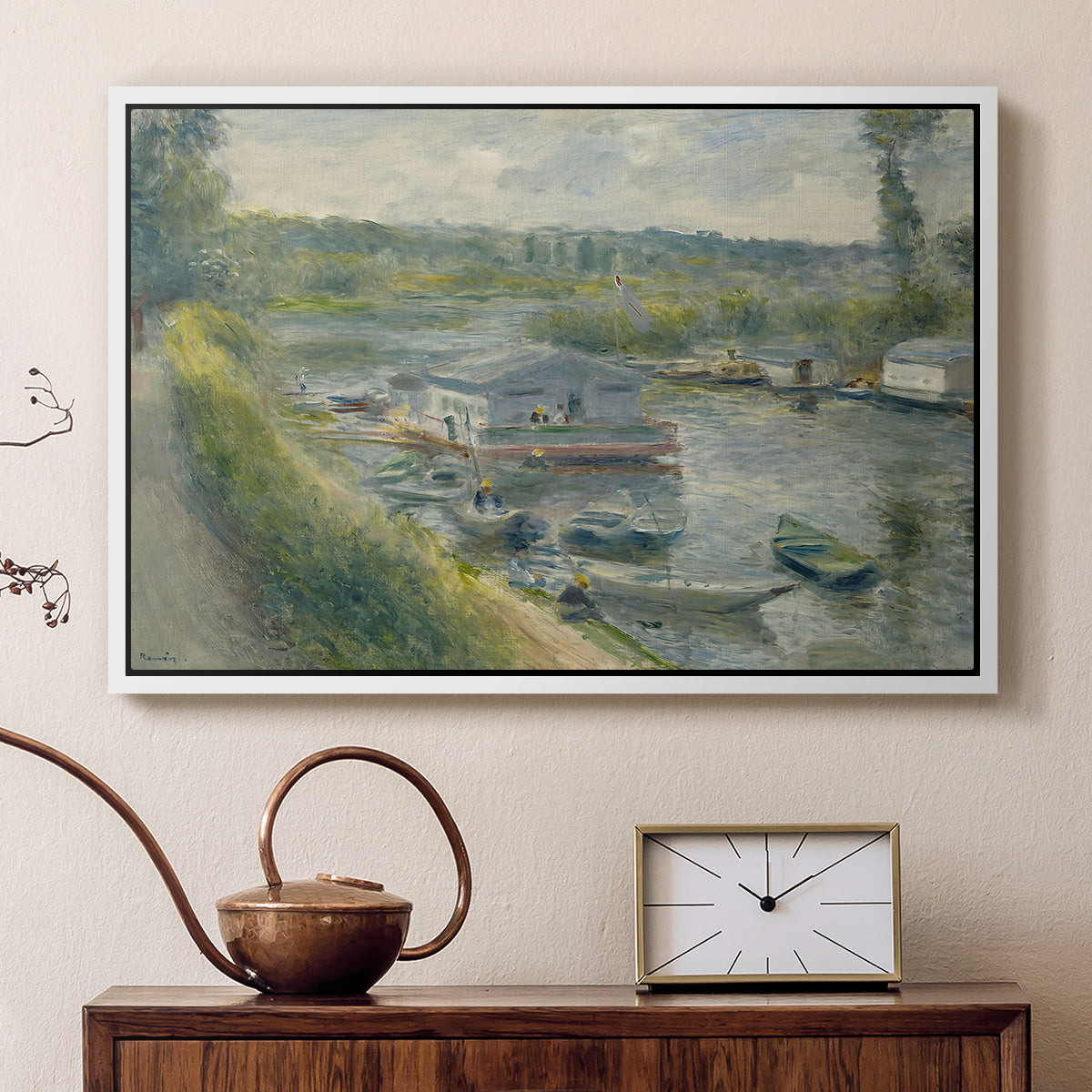 White floater framed canvas featuring an impressionist depiction of working boat along calm waterway, displayed above a cabinet in a soft-toned living room.