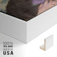 Close-up of the white floater frame corner and gallery wrapped canvas construction.