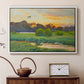 White floater framed canvas featuring a wild duck gliding through a golden sunset sky, displayed above a cabinet in a soft-toned living room.