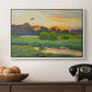Flying Duck at Sunset, 1924 by Bruno Liljefors in a white floater framed canvas displayed above a console table in a hallway, featuring a lone duck flying over a marsh at golden hour.