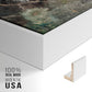 Close-up of the white floater frame corner and gallery wrapped canvas construction.