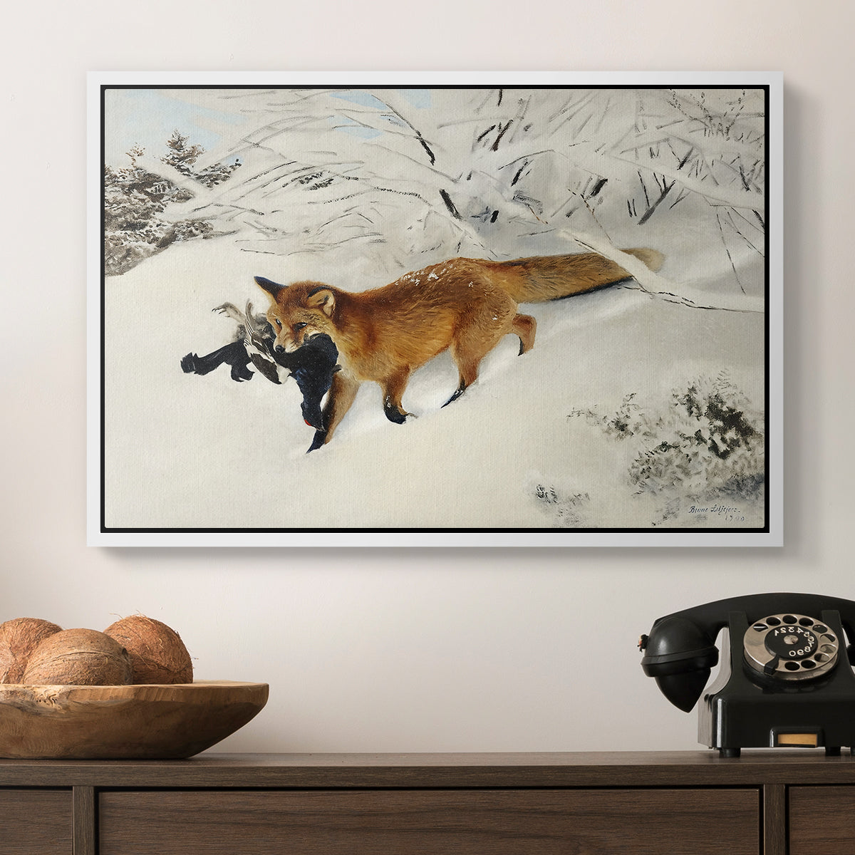 Fox in Snow Landscape, 1900 by Bruno Liljefors in a white floater framed canvas displayed above a console table in a hallway, featuring a dynamic depiction of animal in cold snowy environment.