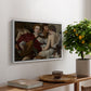 The Musicians, c. 1595 by Caravaggio, presented in a white floater framed canvas featuring a group of young men gathered together playing music with instruments, displayed above a hallway console table.