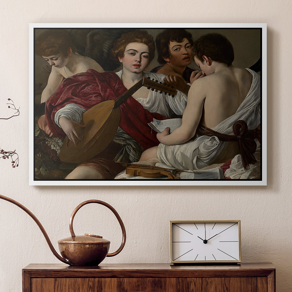 White floater framed canvas featuring an intimate scene of youths making music with sheet music and instruments, displayed above a cabinet in a soft-toned living room.