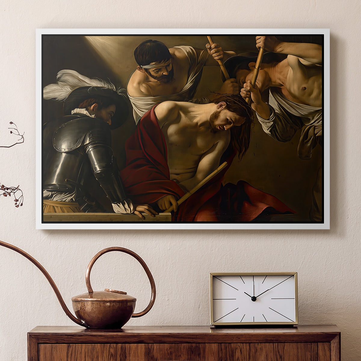 White floater framed canvas featuring a dramatic depiction of figures forcing thorn crown onto Christ, displayed above a cabinet in a soft-toned living room.