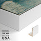 Close-up of the white floater frame corner and gallery wrapped canvas construction.