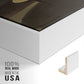 Close-up of the white floater frame corner and gallery wrapped canvas construction.