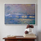 White floater framed canvas featuring Charing Cross Bridge, 1903 by Claude Monet above an entryway table in a minimalist foyer.