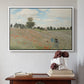 White floater framed canvas featuring The Poppy Field near Argenteuil, 1873 by Claude Monet above an entryway table in a minimalist foyer.