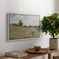 The Poppy Field near Argenteuil, 1873 by Claude Monet, presented in a white floater framed canvas featuring a field of red poppies with figures walking across rolling landscape, displayed above a hallway console table.