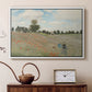 White floater framed canvas featuring a bright meadow filled with poppies under open sky, displayed above a cabinet in a soft-toned living room.