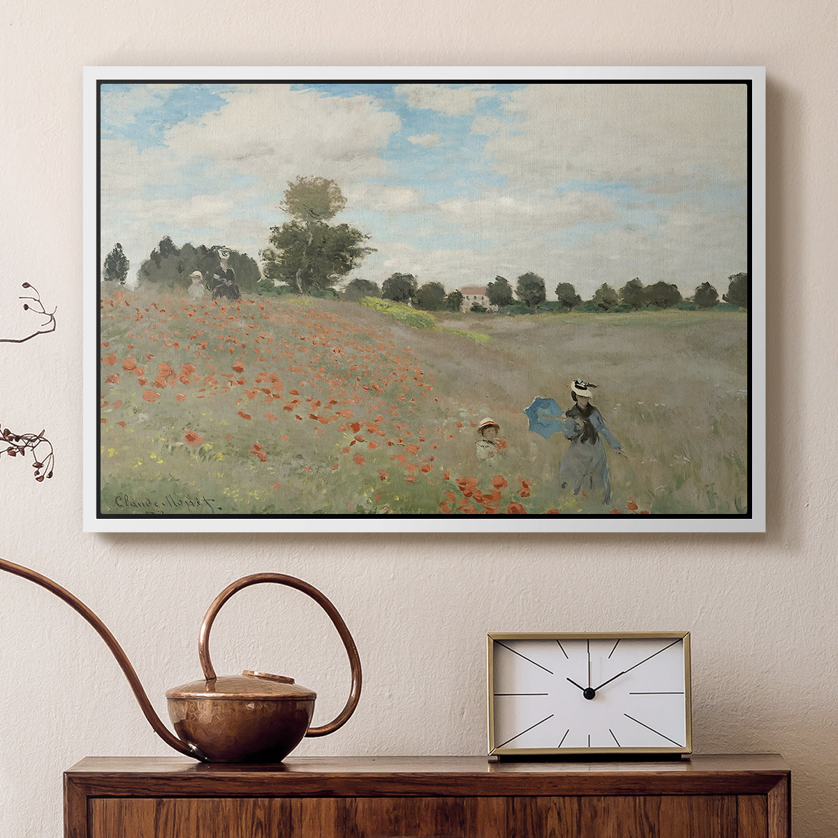 White floater framed canvas featuring a bright meadow filled with poppies under open sky, displayed above a cabinet in a soft-toned living room.