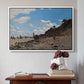 White floater framed canvas featuring The Beach at Honfleur, 1864 by Claude Monet above an entryway table in a minimalist foyer.