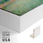 Close-up of the white floater frame corner and gallery wrapped canvas construction.