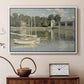 White floater framed canvas featuring a bright landscape featuring bridge and sailboats on calm water, displayed above a cabinet in a soft-toned living room.