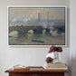 White floater framed canvas featuring Waterloo Bridge, Gray Day, 1903 by Claude Monet above an entryway table in a minimalist foyer.