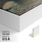 Close-up of the white floater frame corner and gallery wrapped canvas construction.