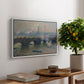 Waterloo Bridge, Gray Day, 1903 by Claude Monet, presented in a white floater framed canvas featuring a muted cityscape of bridge spanning river under overcast sky, displayed above a hallway console table.