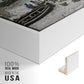Close-up of the white floater frame corner and gallery wrapped canvas construction.