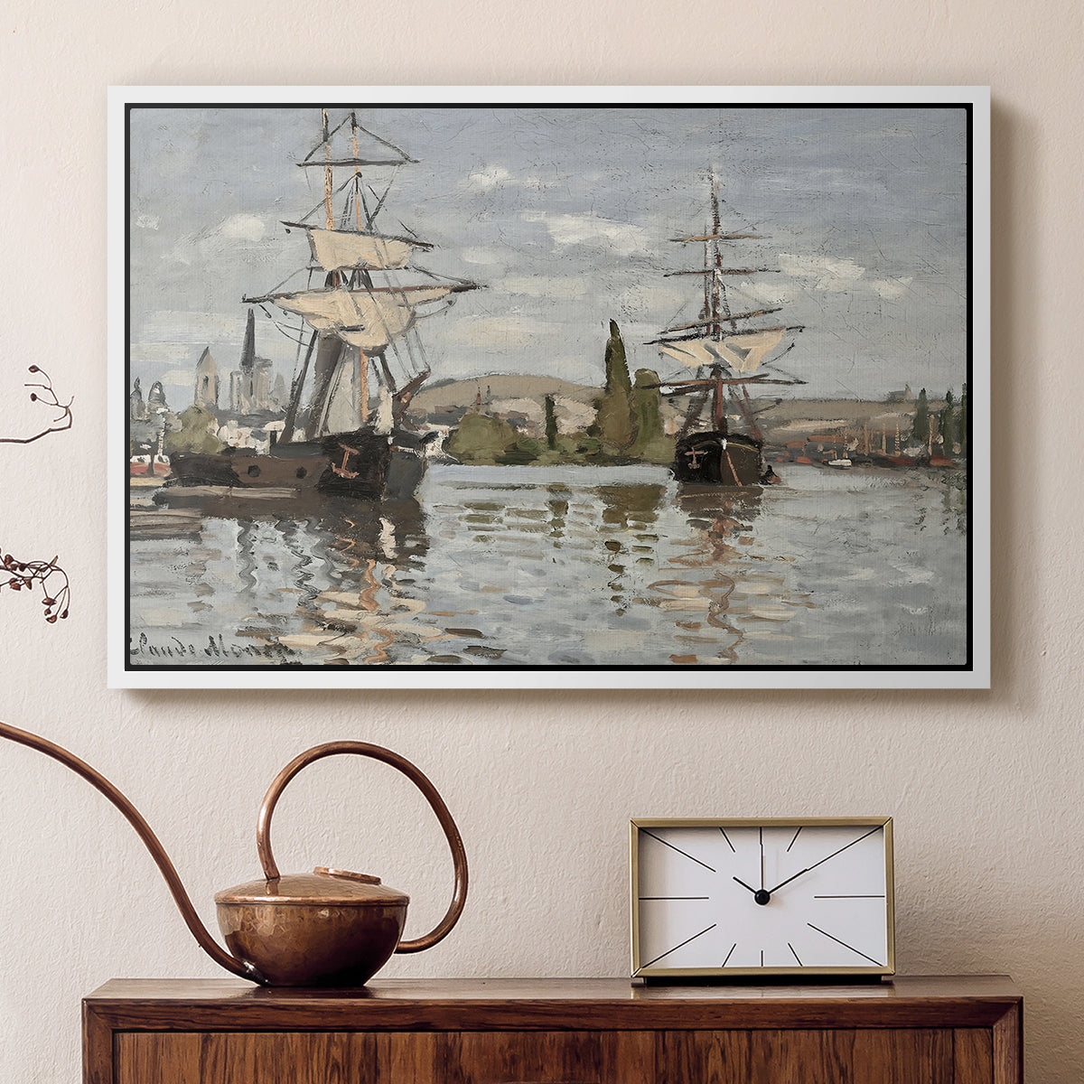 White floater framed canvas featuring a harbor view with tall ships lining the waterfront in muted tones, displayed above a cabinet in a soft-toned living room.