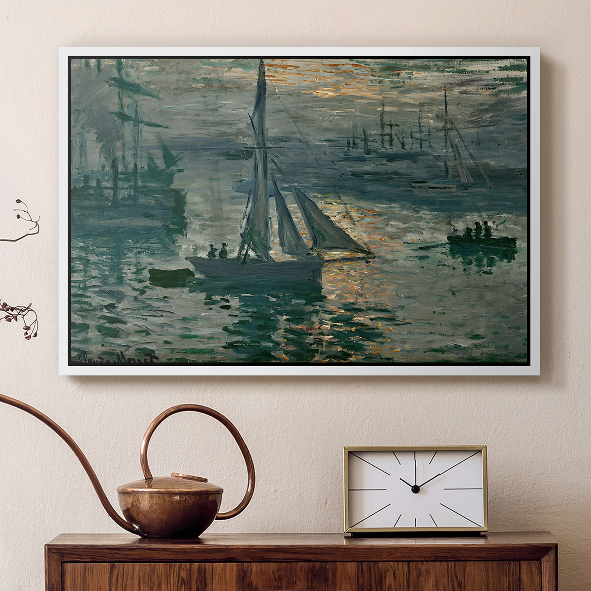 White floater framed canvas featuring an early morning harbor scene with boats and diffused light, displayed above a cabinet in a soft-toned living room.