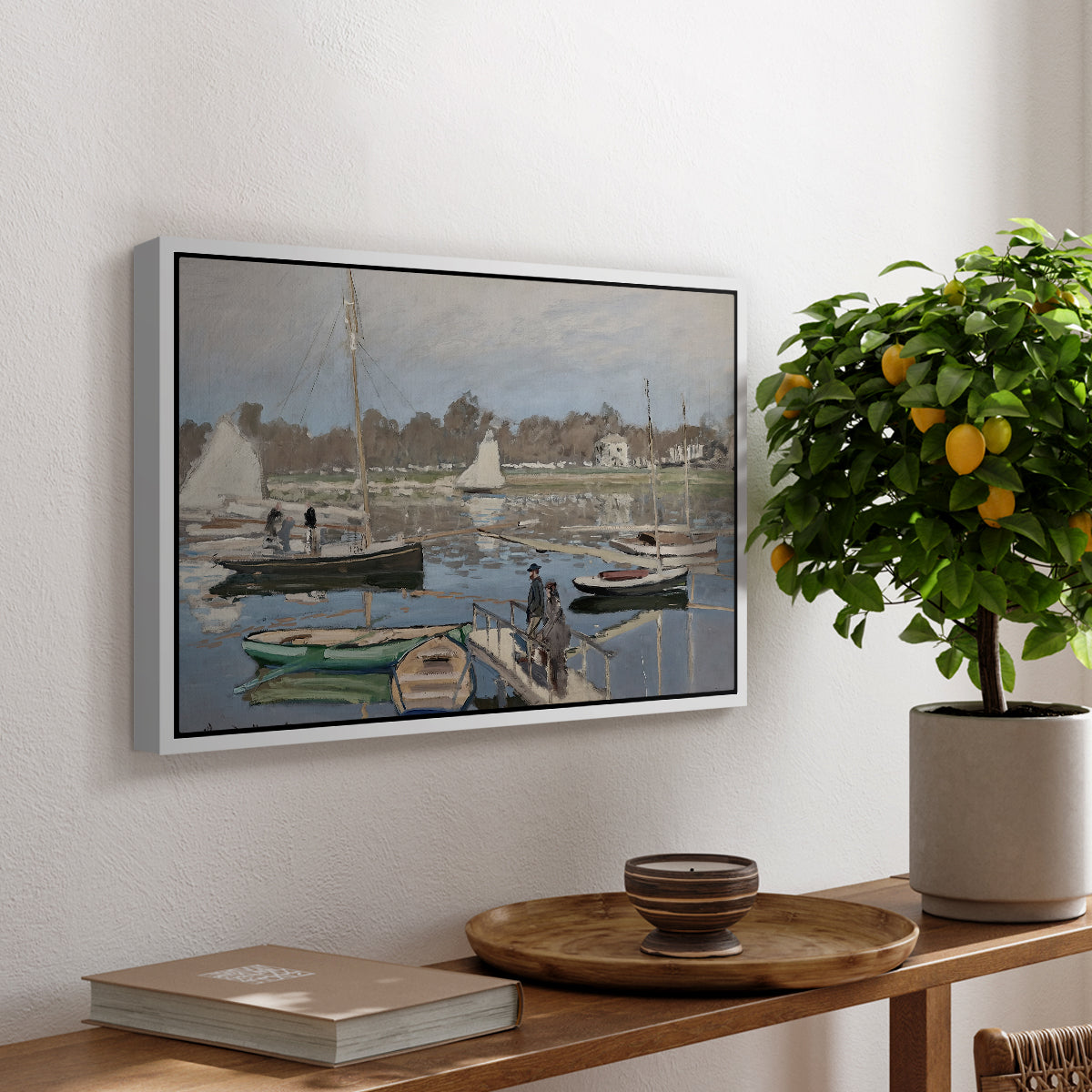 The Basin at Argenteuil, 1874 by Claude Monet, presented in a white floater framed canvas featuring sailboats gathered in calm basin with reflections on water, displayed above a hallway console table.