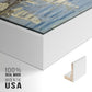 Close-up of the white floater frame corner and gallery wrapped canvas construction.