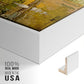 Close-up of the white floater frame corner and gallery wrapped canvas construction.