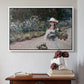 White floater framed canvas featuring Young Girl in the Garden at Giverny, 1888 by Claude Monet above an entryway table in a minimalist foyer.
