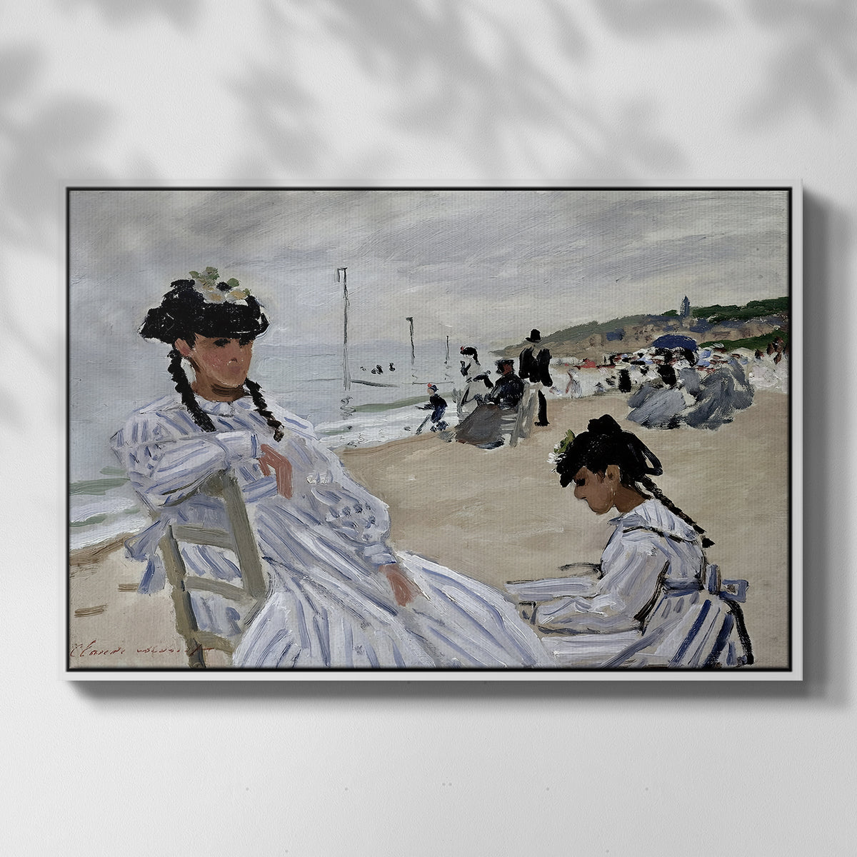 Front view of On the Beach at Trouville, 1870 by Claude Monet in a white floater framed canvas.