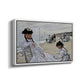 Angled view of On the Beach at Trouville, 1870 by Claude Monet in a white floater framed canvas.