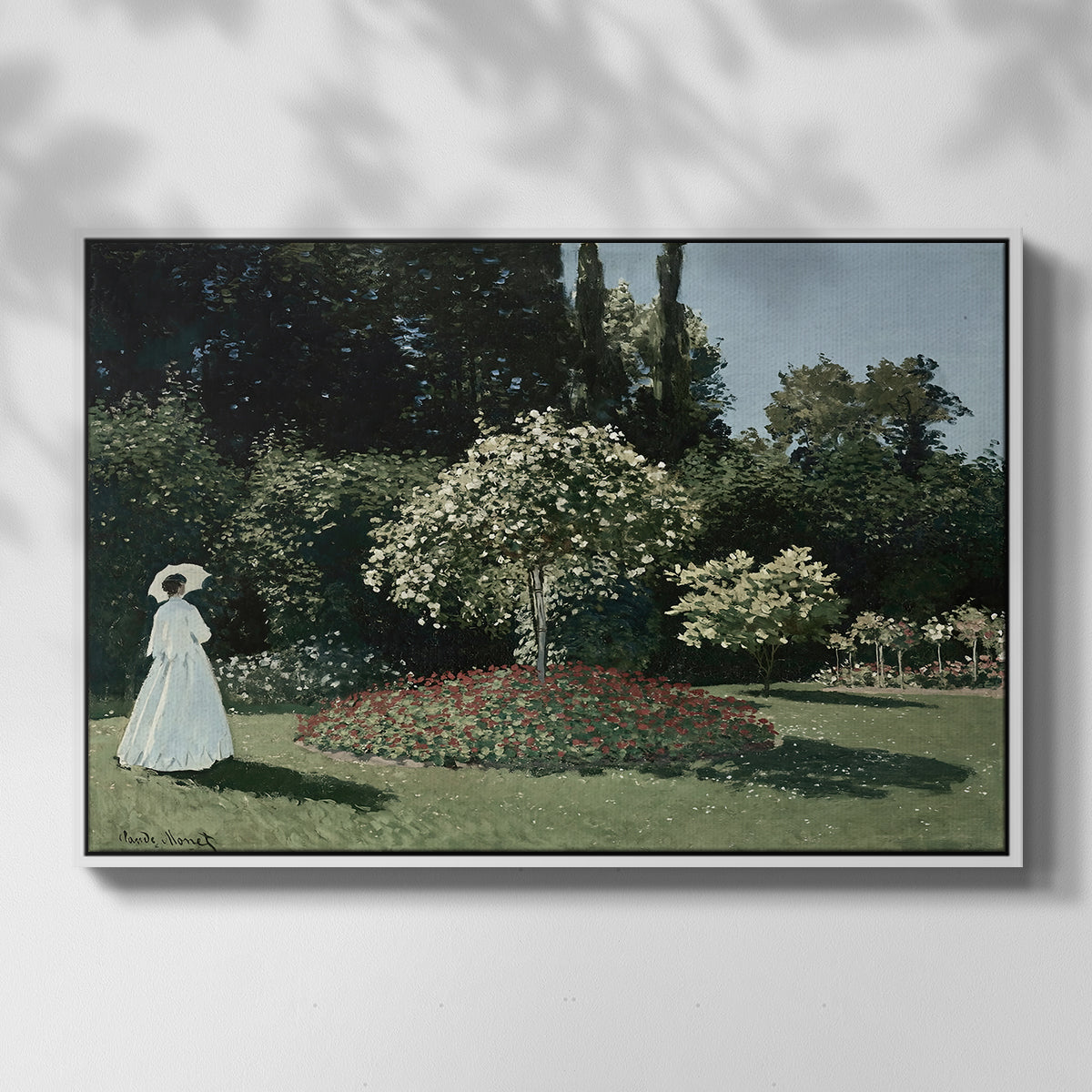 Front view of Woman in the Garden, Sainte-Adresse, 1867 by Claude Monet in a white floater framed canvas.