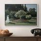 Woman in the Garden, Sainte-Adresse, 1867 by Claude Monet in a white floater framed canvas displayed above a console table in a hallway, featuring a tranquil garden portrait with soft natural light.