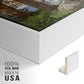 Close-up of the white floater frame corner and gallery wrapped canvas construction.
