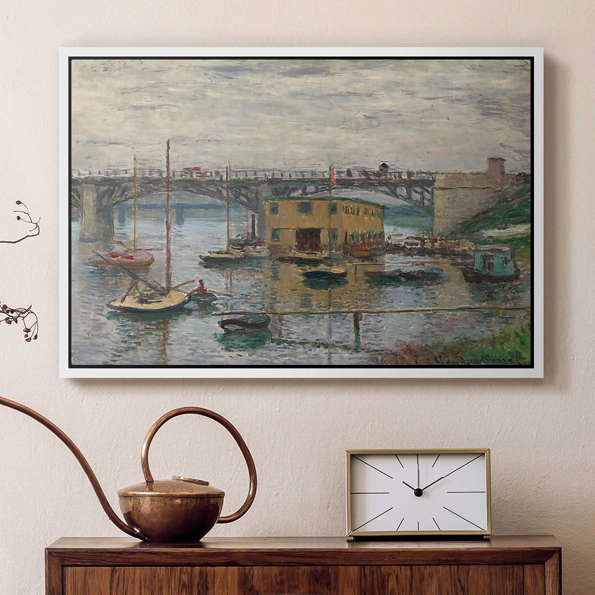 White floater framed canvas featuring a calm water scene with bridge fading into cloudy sky, displayed above a cabinet in a soft-toned living room.