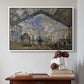 White floater framed canvas featuring The Gare Saint-Lazare, 1877 by Claude Monet above an entryway table in a minimalist foyer.