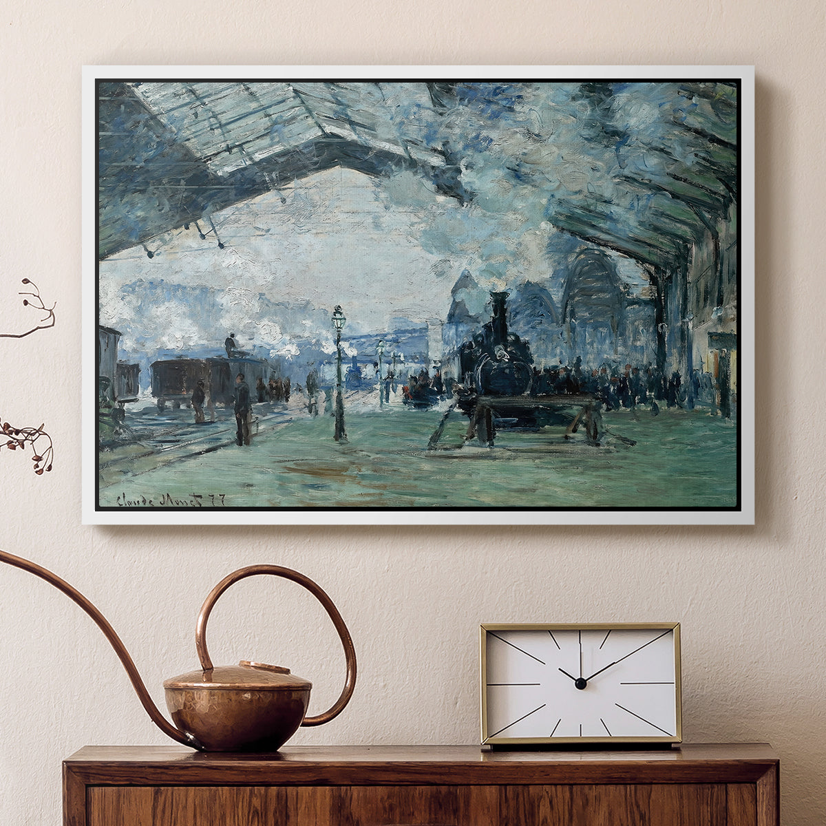 White floater framed canvas featuring an interior view of station filled with movement and smoke, displayed above a cabinet in a soft-toned living room.