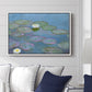 Water Lilies (Nymphéas), 1897-1899 by Claude Monet displayed above a sofa in a living room in a white floater frame, featuring an impressionist pond scene with lily pads and soft reflections.