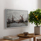 Windmills near Zaandam, 1871 by Claude Monet, presented in a white floater framed canvas featuring windmills standing beside water under open sky in rural landscape, displayed above a hallway console table.